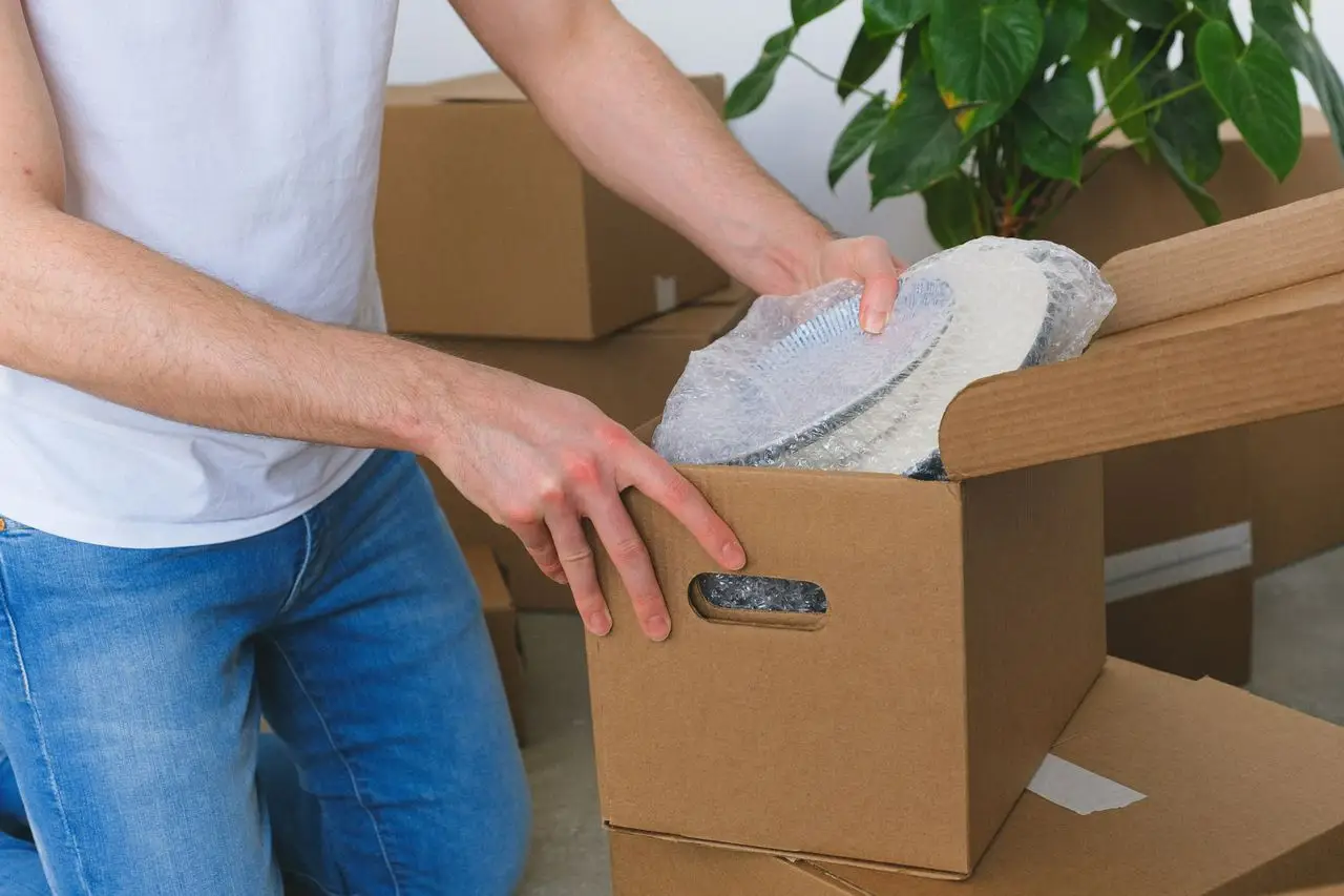 Kitchen items wrapped individually before packing